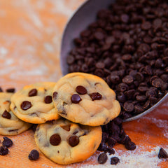 Gourmet Chocolate Chip Cookies - Hand Crafted Since 1955 - Closeup on pink background